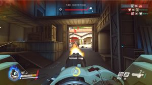 First-person view of a Bastion player in Overwatch attacking targets.